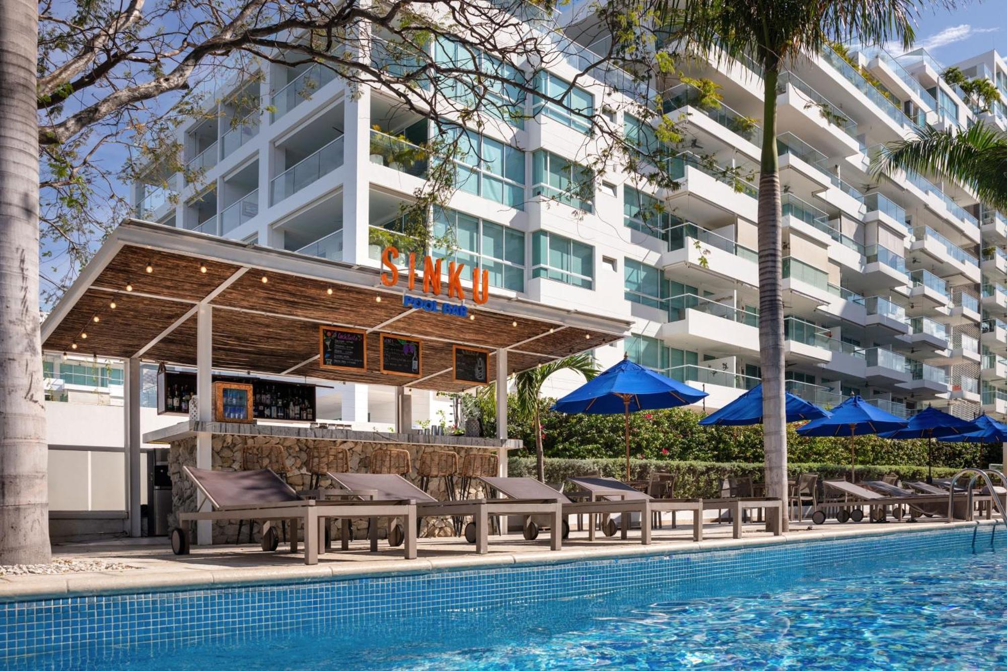 Santa Marta Marriott Resort Playa Dormida Экстерьер фото The swimming pool at the hotel